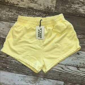Daily Drills super shorts from their latest drop in the color lemonade! Size M/L